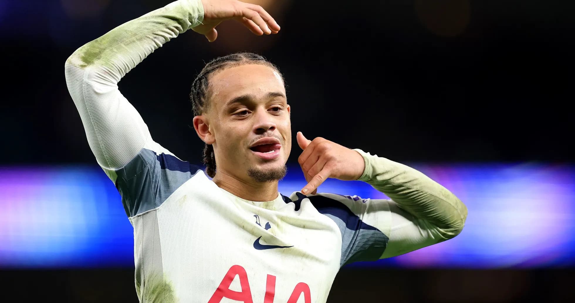 Player celebrating with a phone gesture after match