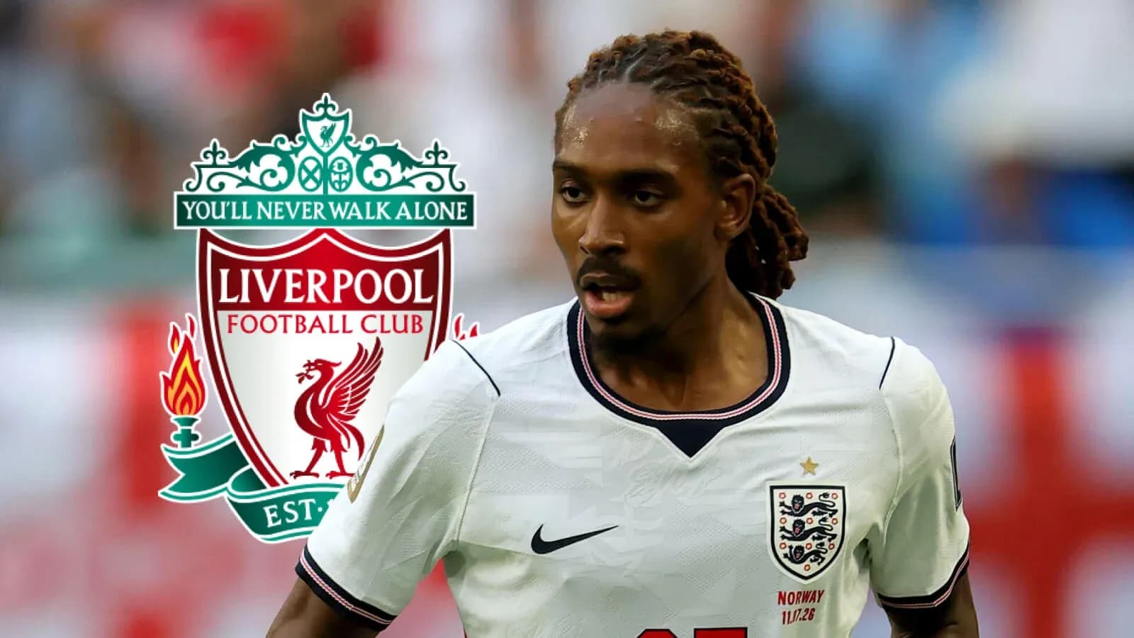 Player running with ball, Liverpool logo in background