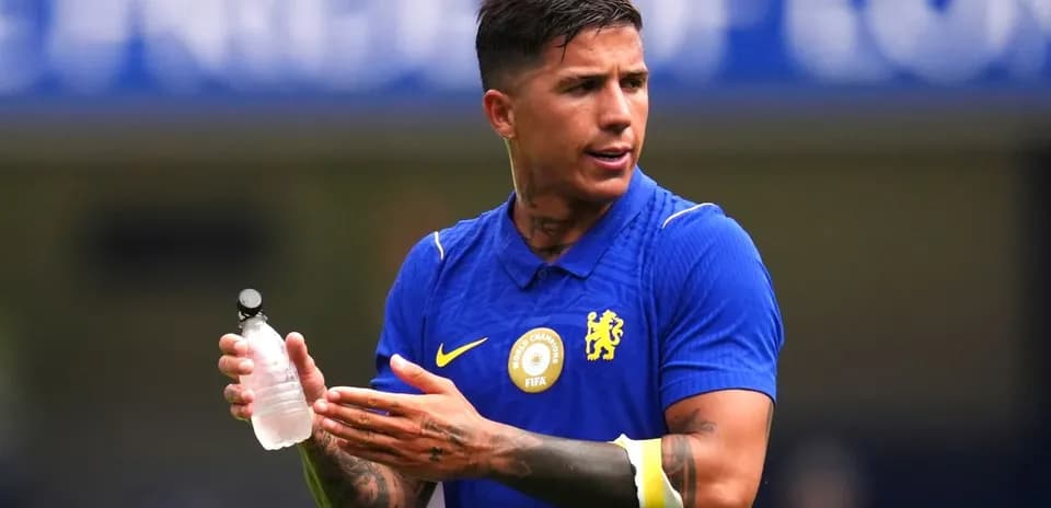 Player holding a water bottle during training session
