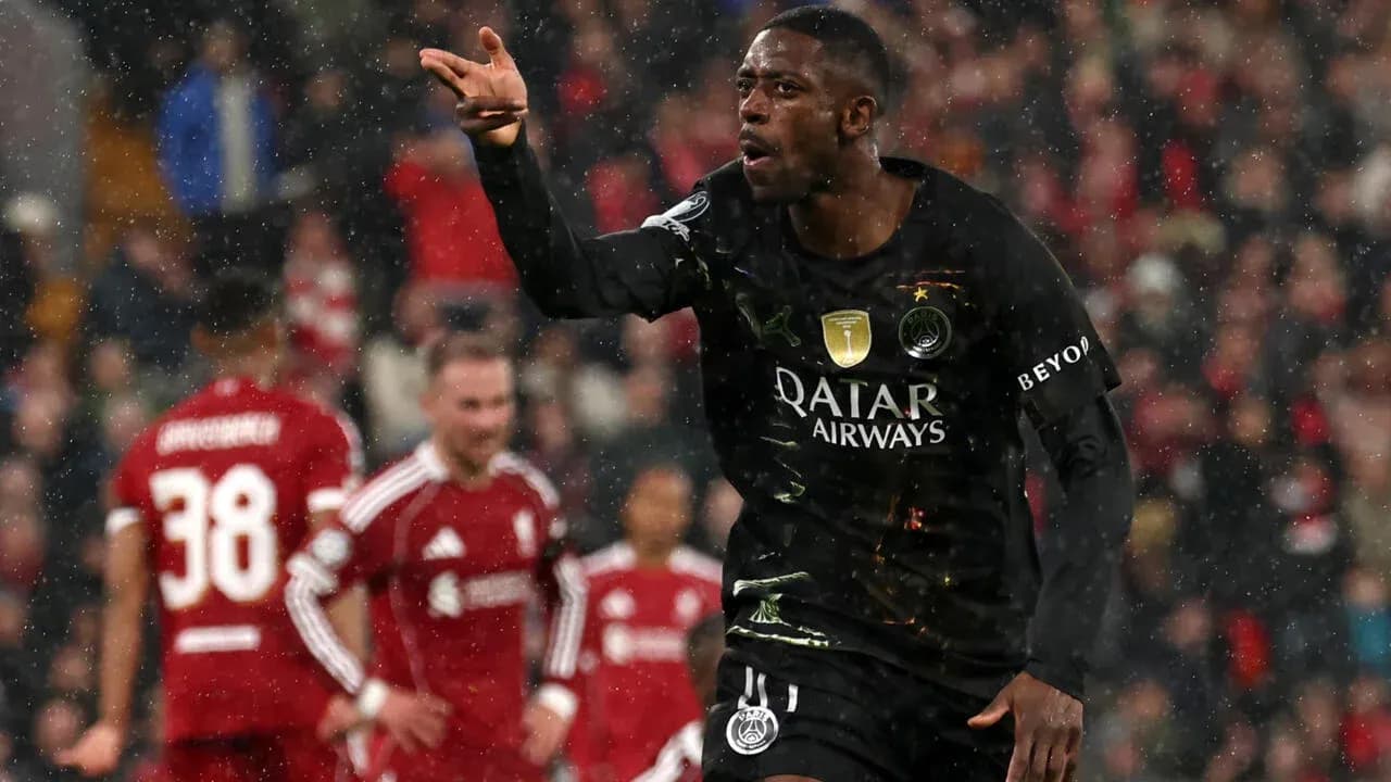 Player celebrating during match in rainy conditions