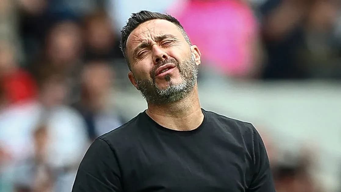 Coach reacting during a match on the sideline
