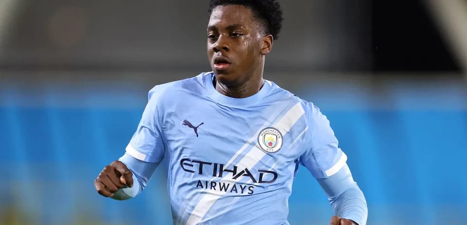 Player running during a Manchester City match