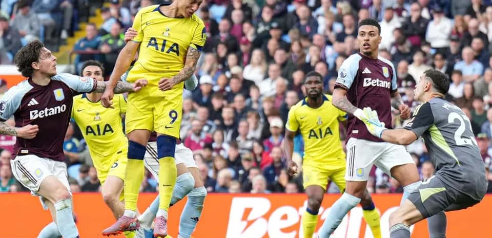 Richarlison heading the ball during match