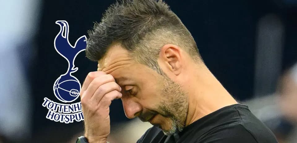 Coach looking concerned during match at Tottenham Hotspur