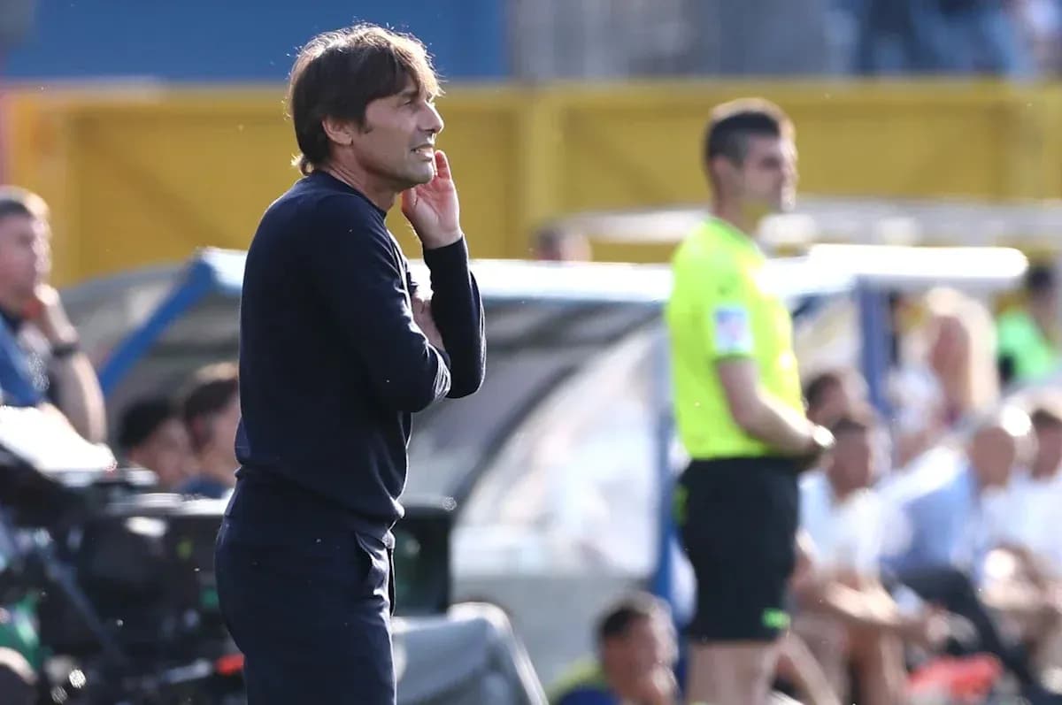 Coach observing the match from the sidelines