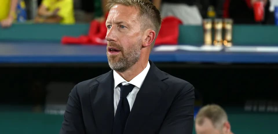 Coach observing the match from the sidelines
