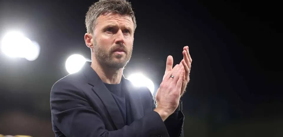 Coach applauding on the sidelines during match