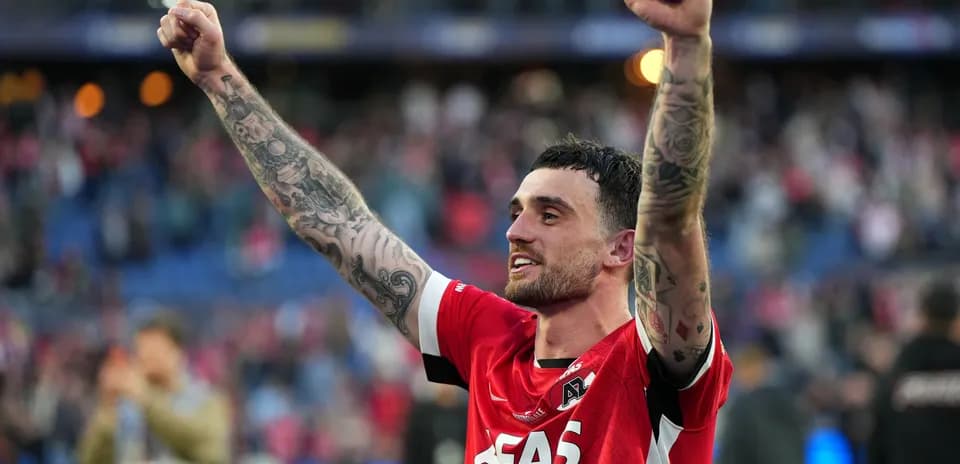 Player celebrating with raised fists after match