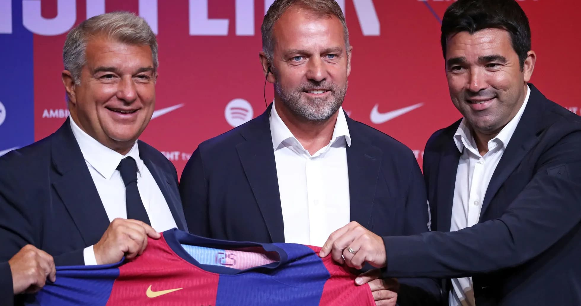 Officials presenting new Barcelona jersey at press event