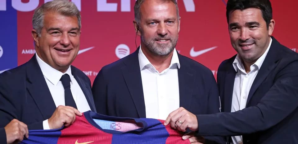 Officials presenting new Barcelona jersey at press event
