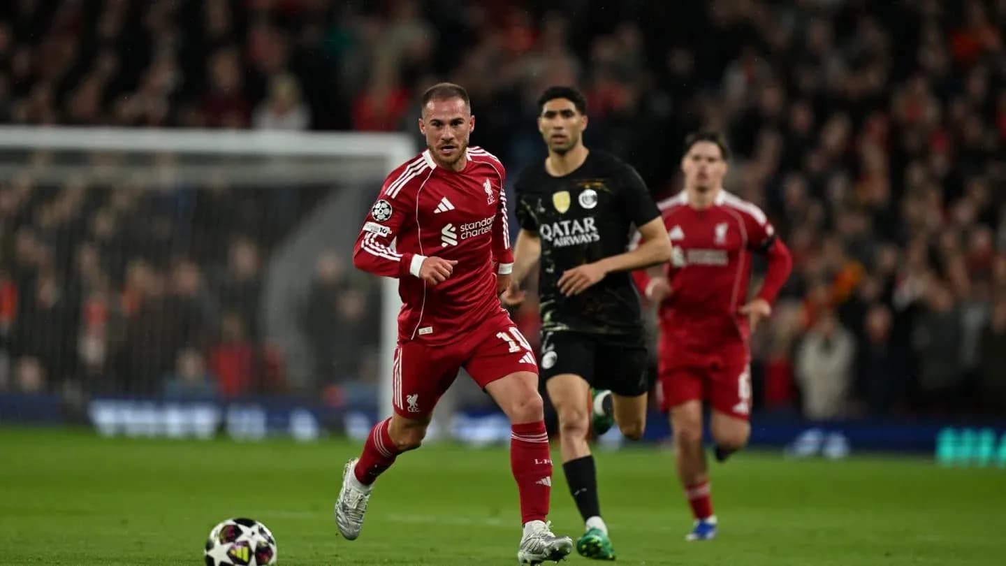 Liverpool player sprinting during a Champions League match