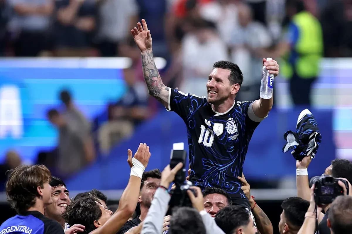 Player celebrating with teammates after match victory