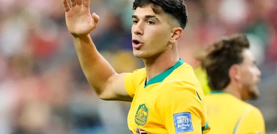 Australian player gesturing during a match