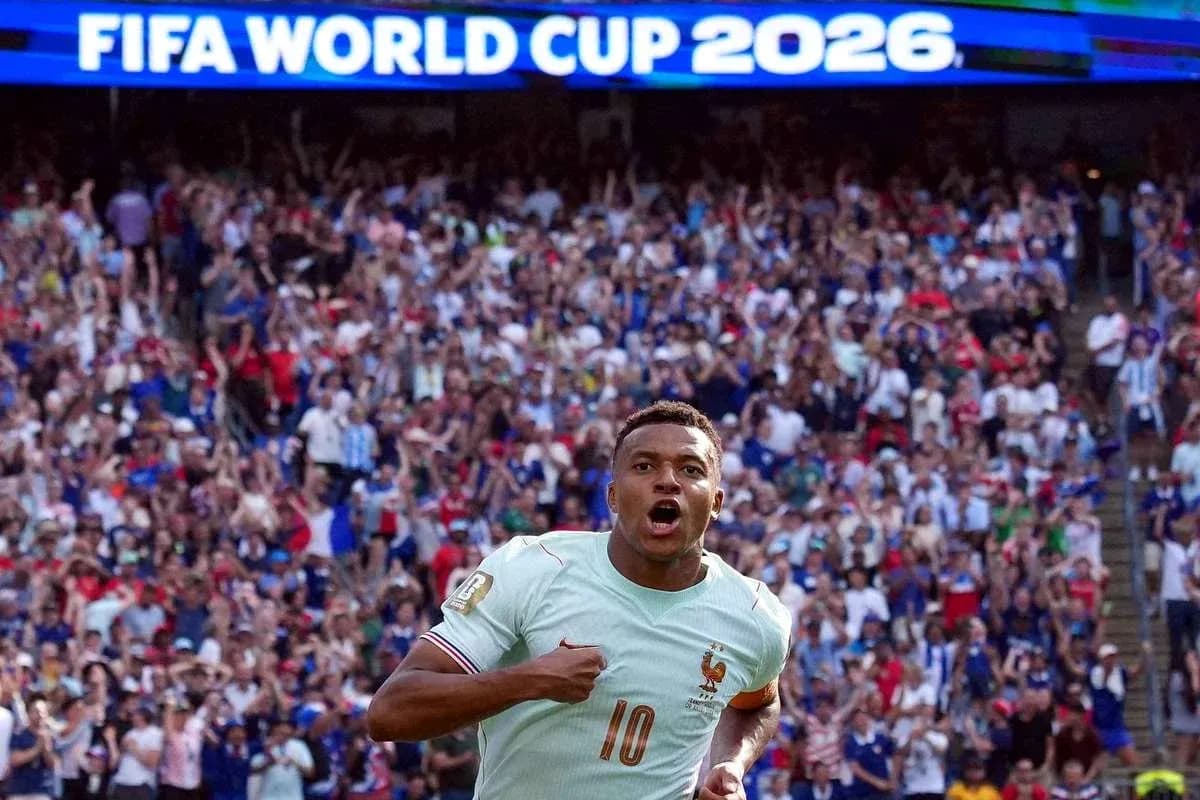 Player celebrating in front of cheering crowd