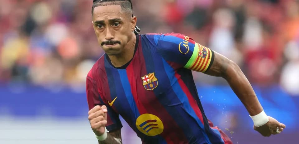 Barcelona player running on the pitch during match