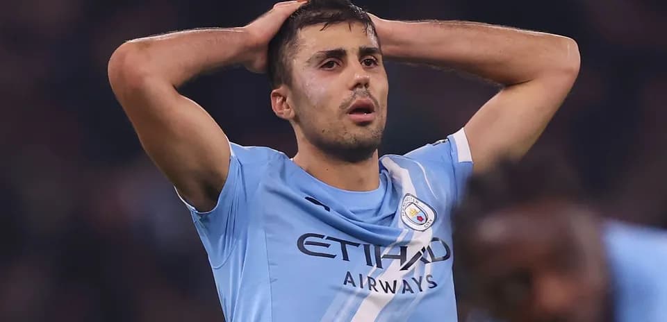 Player holding head in disappointment during match