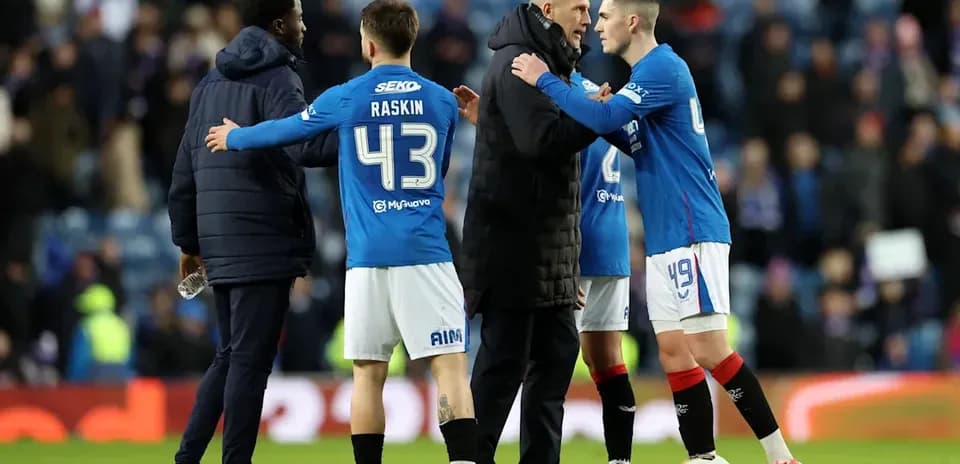 Players and coach discussing after the match