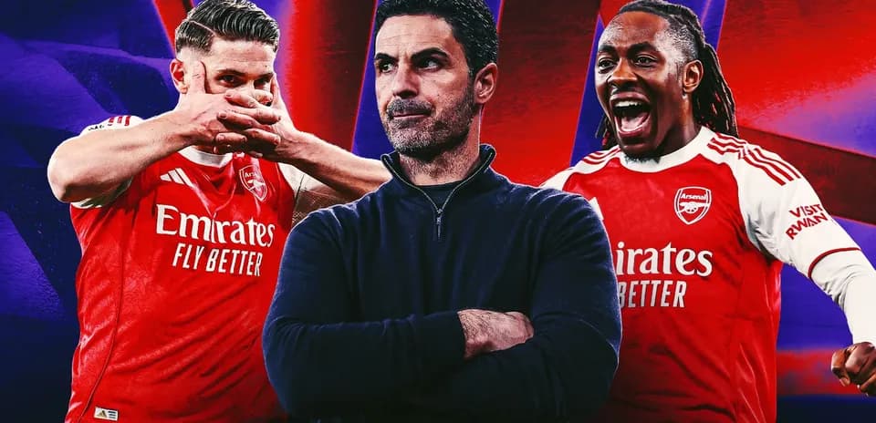 Arsenal manager with two celebrating players