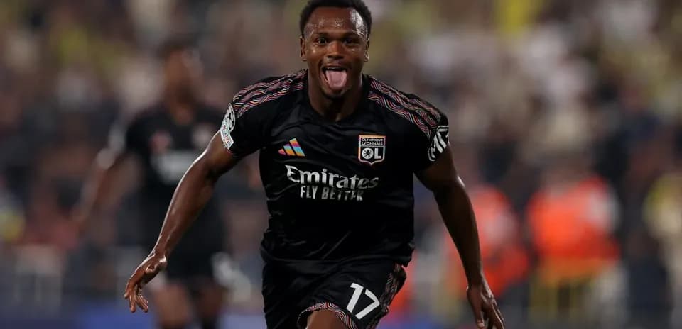 Lyon player celebrating a goal during match