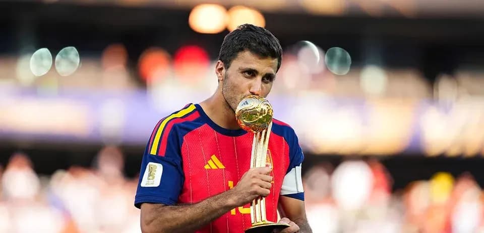 Player kissing trophy after winning World Cup