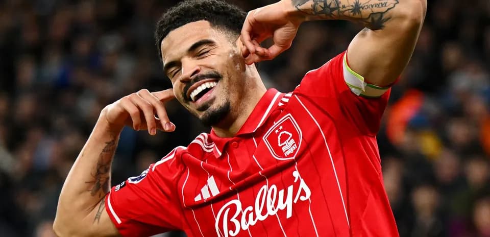 Player celebrating a goal in red team jersey