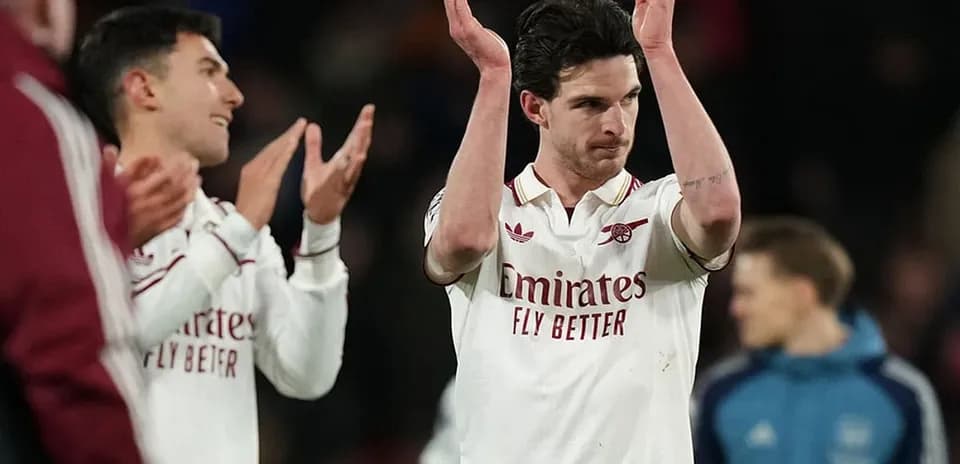 Arsenal players celebrating after a match