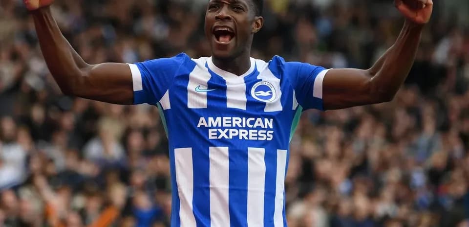 Player celebrating in Brighton & Hove Albion kit