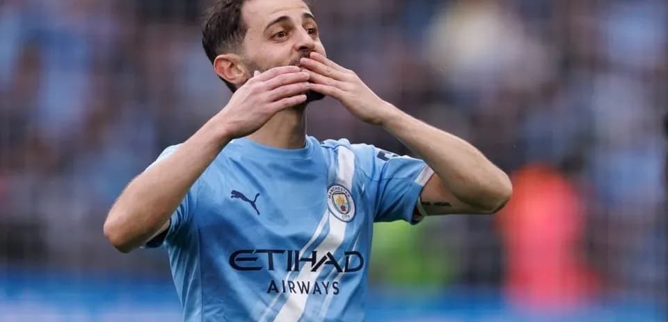 Player celebrating during match in blue kit