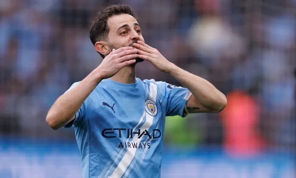 Player celebrating during match in blue kit