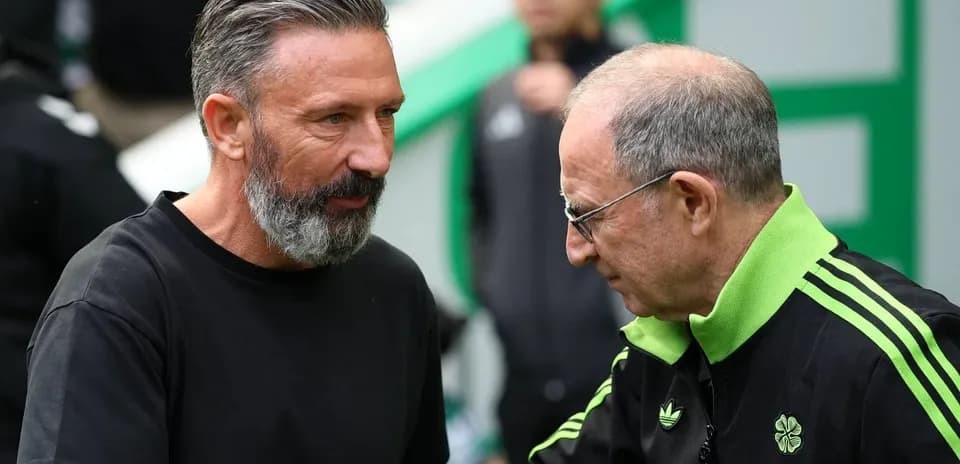Two coaches interacting before a match