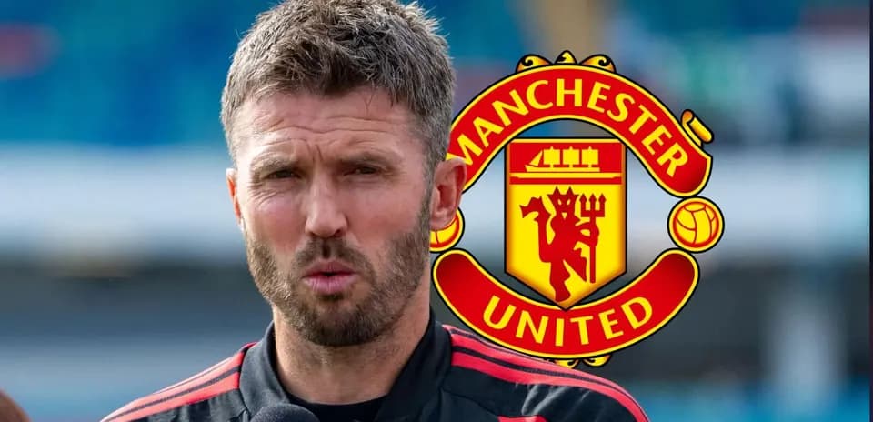 Coach speaking during press conference with Manchester United logo