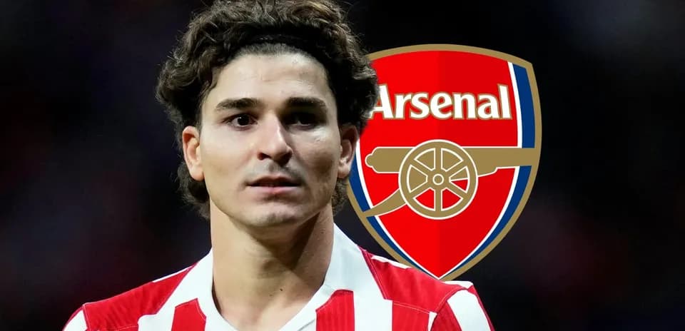Player in red and white jersey with Arsenal logo background