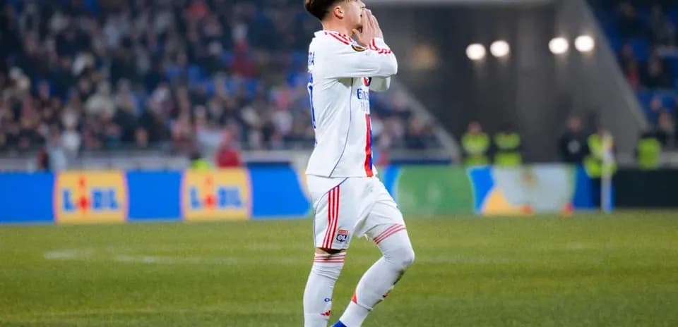 Player gesturing on the field during a match