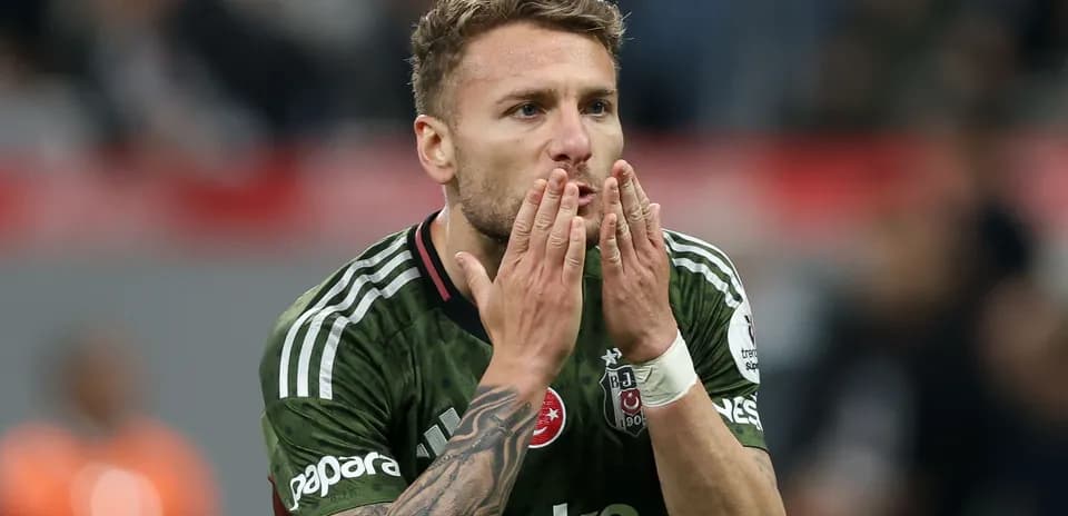 Player blowing kisses during a football match
