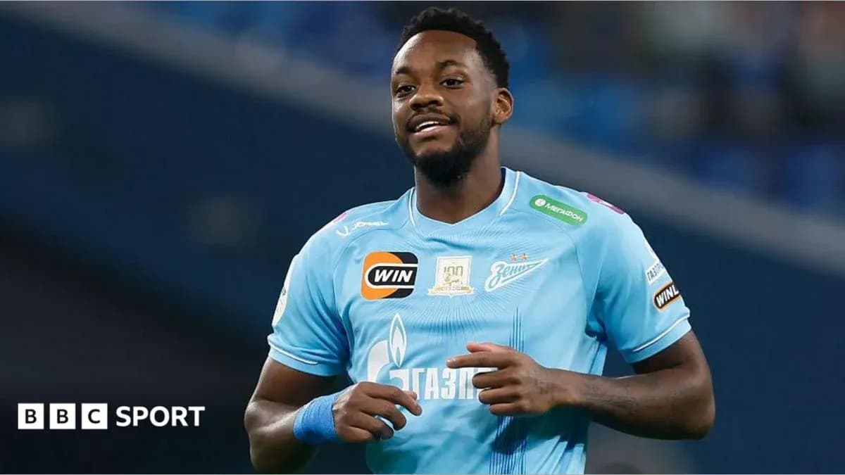 Player in blue jersey celebrating on the field