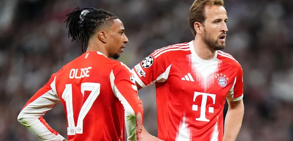 Bayern Munich players discussing during a match