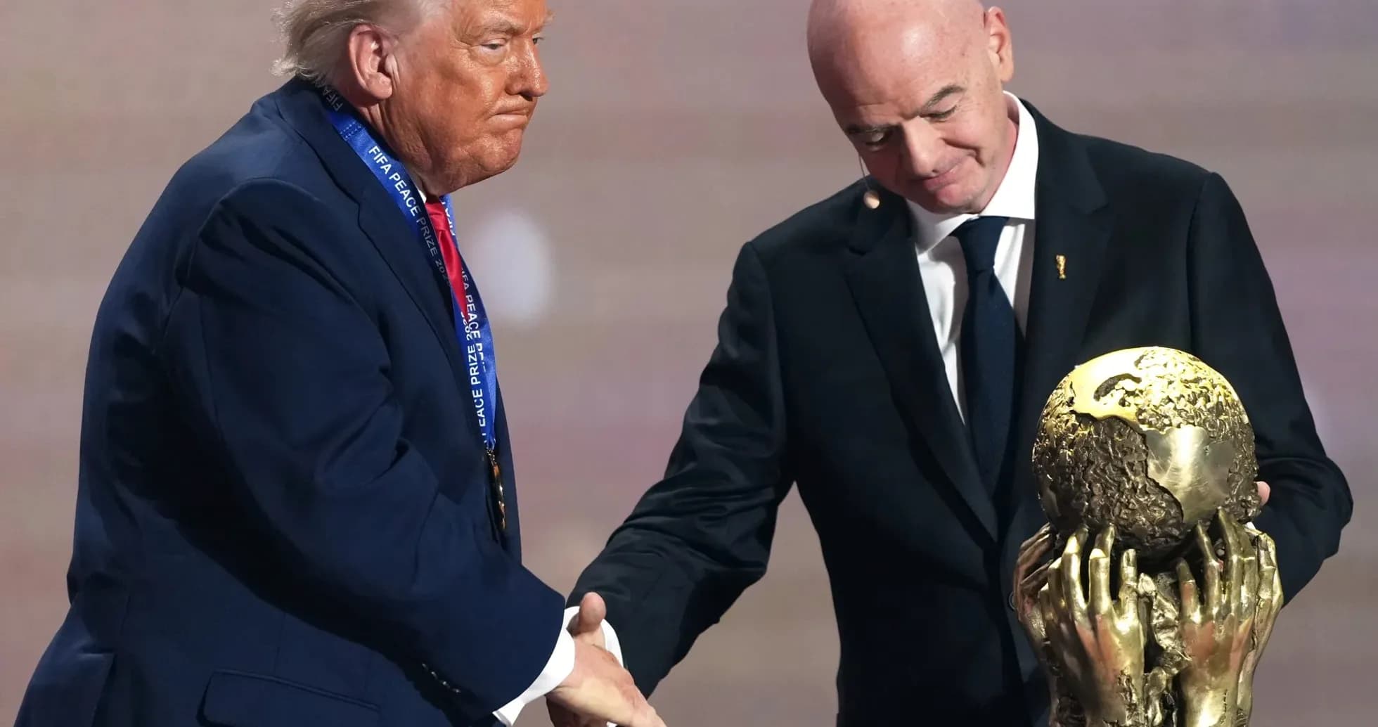 Donald Trump receiving FIFA Peace Prize from Gianni Infantino