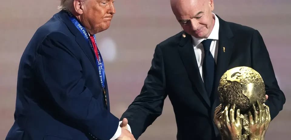 Donald Trump receiving FIFA Peace Prize from Gianni Infantino