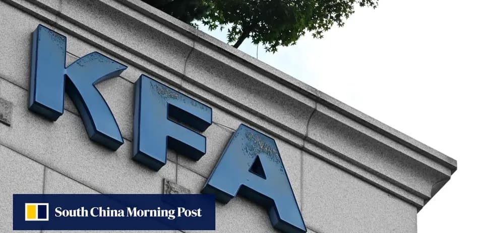 KFA sign on building exterior with trees above