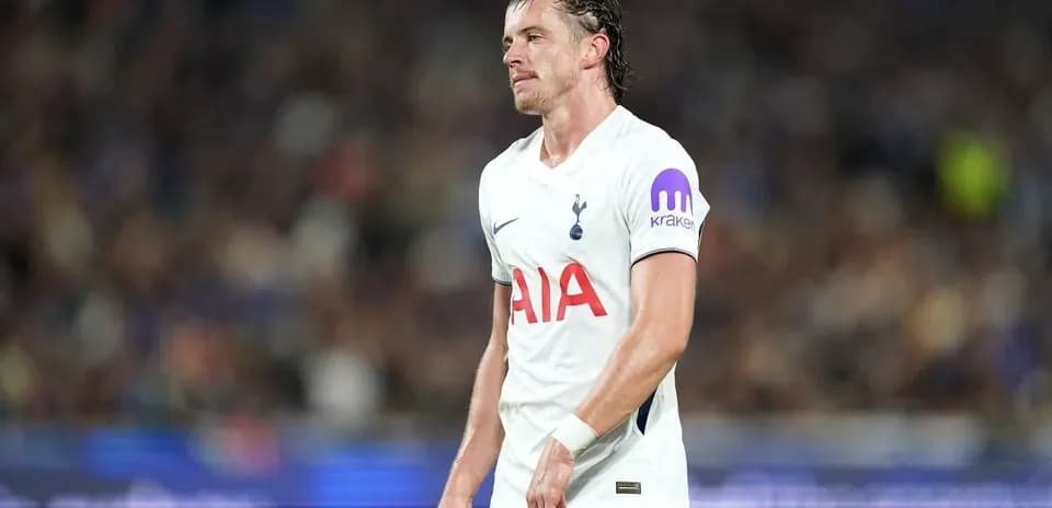 Tottenham player looking down during match