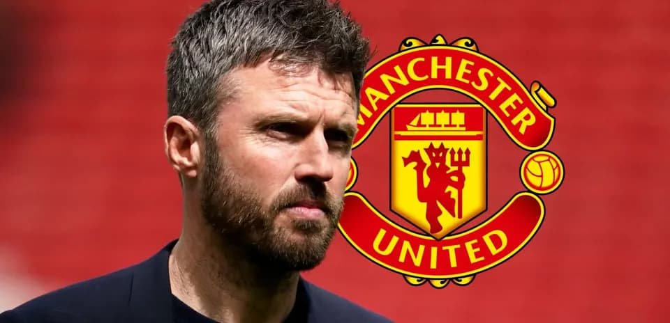 Man with beard in front of Manchester United logo