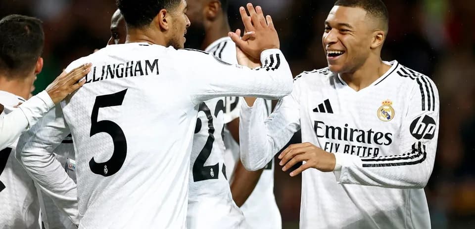 Real Madrid players celebrating a goal