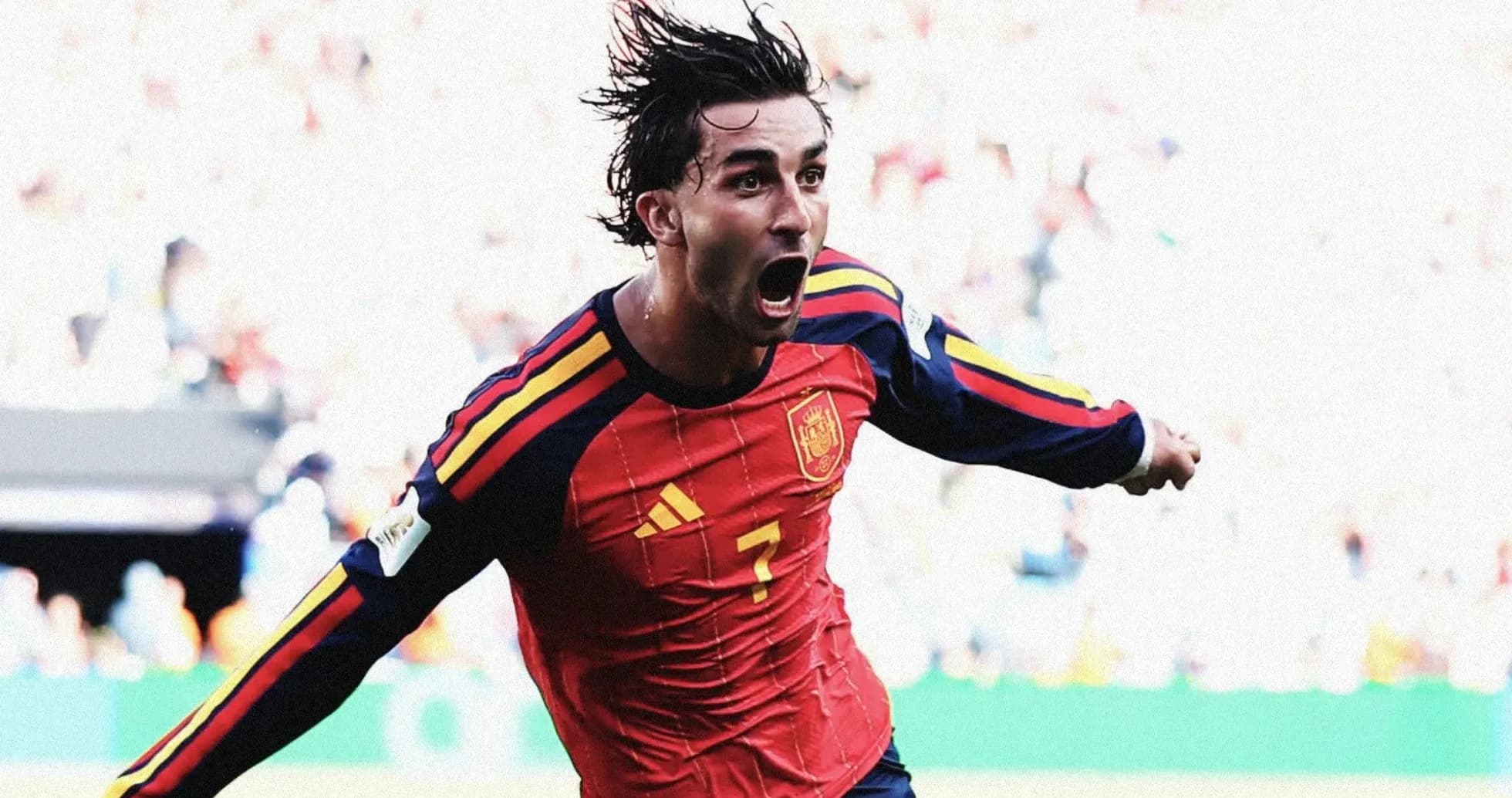 Player celebrating after scoring a goal for Spain