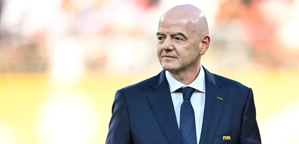 FIFA president in suit at event venue
