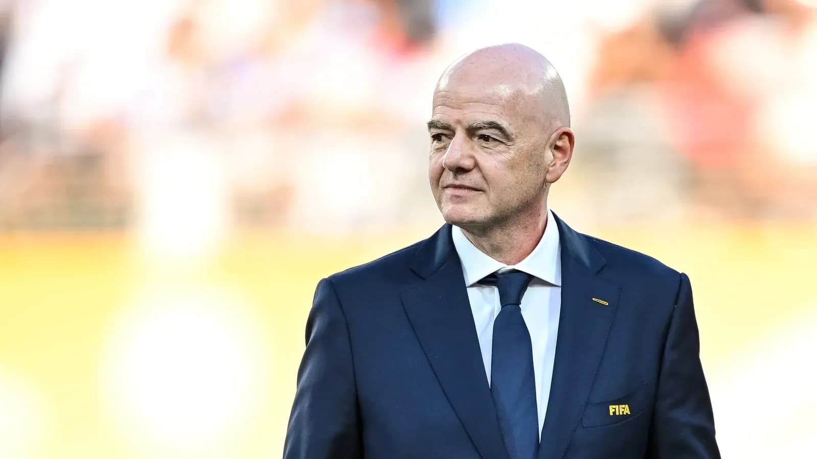 FIFA president in suit at event venue