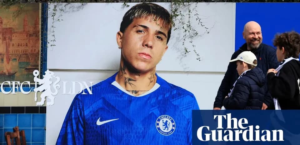 Player in Chelsea jersey displayed on wall