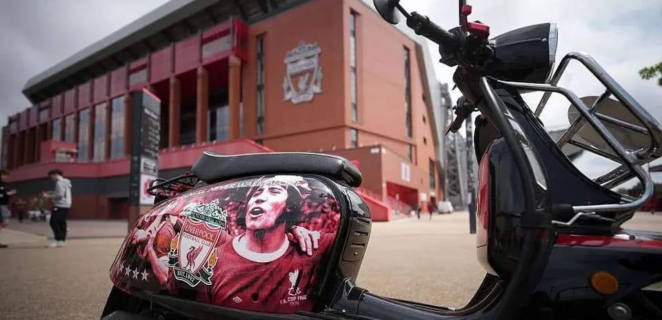 Scooter with Liverpool FC logo outside stadium