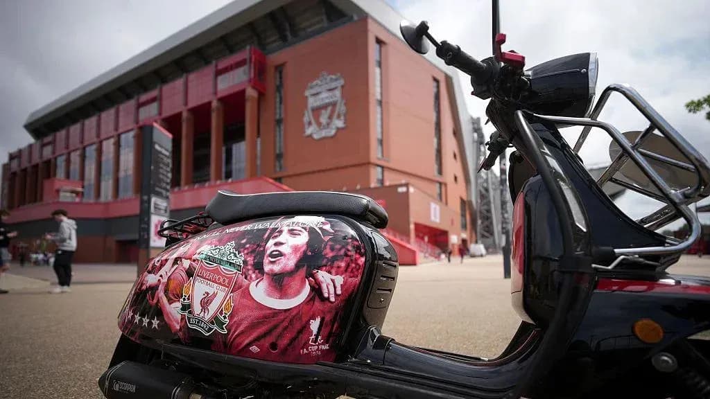 Scooter with Liverpool FC logo outside stadium
