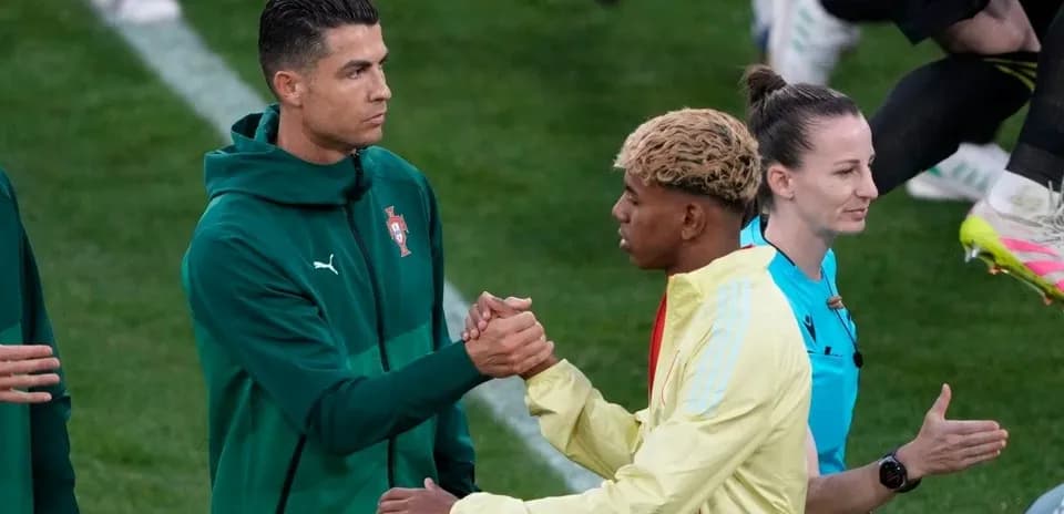 Two players shaking hands before a match