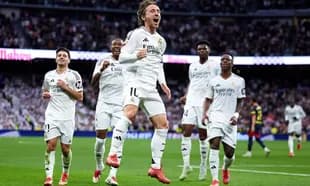 Real Madrid players celebrating a goal